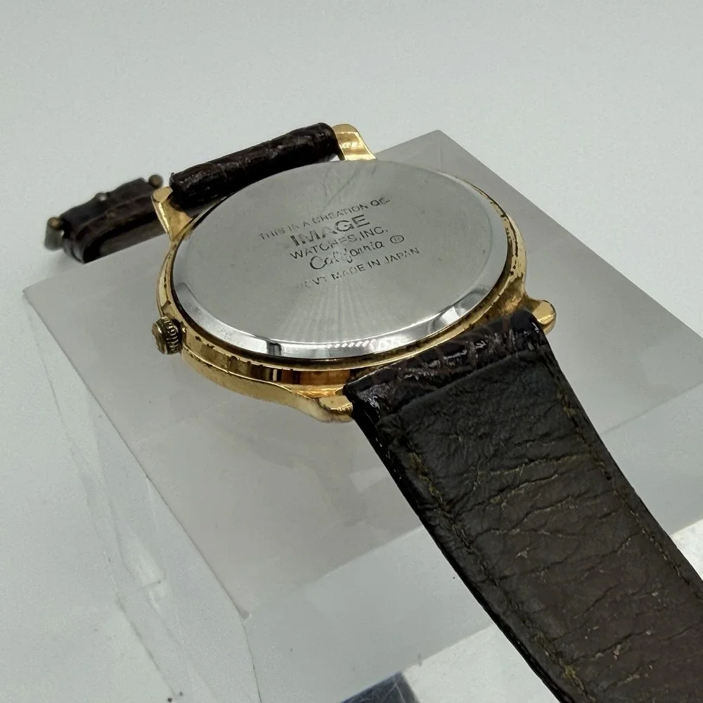 Alfred Hitchcock‎ Logo Image Watches Inc California Japan Movt Gold Tone Watch